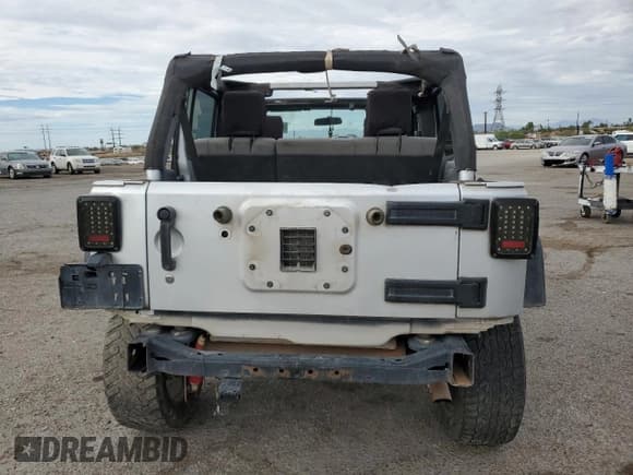 ✅ 2008 Jeep Wrangler Unlimited Rubicon • VIN: 1J8GA69188L586055 • Lot: 80672785. Listed on Copart with 242,392 mi. Free auction sales archive from the USA and detailed vehicle history report at DreamBid. Image 6.