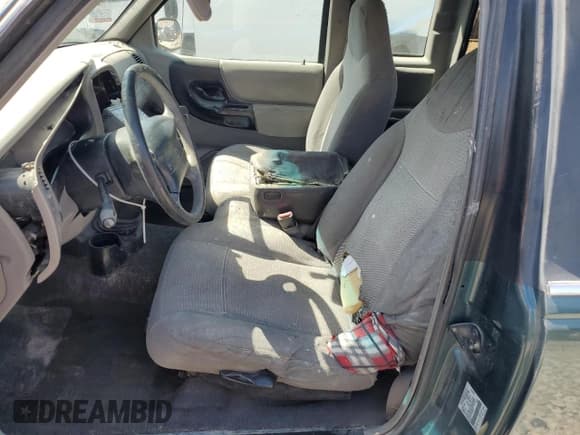 ✅ 1999 Mazda B-Series SE • VIN: 4F4YR16V3XTM39484 • Лот: 61791955. Опубликован ранее на Copart с пробегом 283 822 миль. Бесплатный доступ к архиву аукционных продаж из США и подробный отчёт об истории автомобиля на DreamBid. Изображение 7.