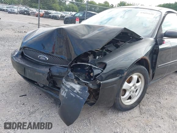 ✅ 2004 Ford Taurus SE • VIN: 1FAFP53284G179777 • Lot: 43053159. Wystawiony na IAAI z przebiegiem Nie podano. Bezpłatny archiwum sprzedaży aukcyjnych z USA i szczegółowy raport historii pojazdu na DreamBid. Zdjęcie 6.