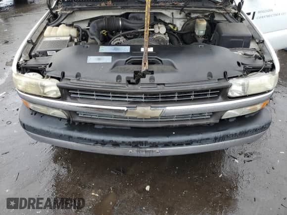 2002 Chevrolet Silverado 1500 z VIN 1GCEC14W12Z185739, wystawiony jako Copart lot #71419234 z przebiegiem 131 034 mil mil oraz Czysty tytuł • Clean title. Historia ofert i sprzedaży dostępna na DreamBid. Obrazek 11.