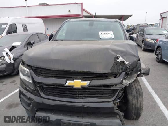 2018 Chevrolet Colorado 2WD Work Truck with VIN 1GCHSBEN1J1285106, listed as a IAAI auction lot 42408472 with 68,524 mi miles and . Bid and sale history available at DreamBid. Image 12.