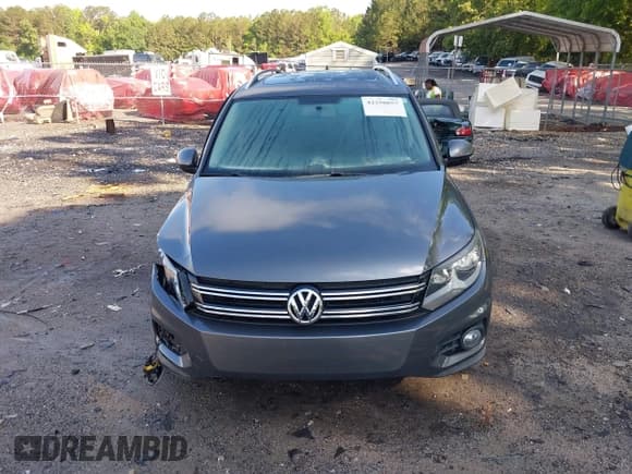 ✅ 2013 Volkswagen Tiguan S • VIN: WVGAV3AX7DW624136 • Lot: 42256657. Listed on IAAI with 124,000 mi. Free auction sales archive from the USA and detailed vehicle history report at DreamBid. Image 12.