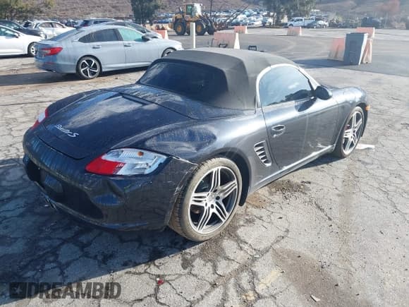 ✅ 2007 Porsche Boxster S • VIN: WP0CB29877U731099 • Lot: 43718431. Listed on IAAI with 39,726 mi. Free auction sales archive from the USA and detailed vehicle history report at DreamBid. Image 4.