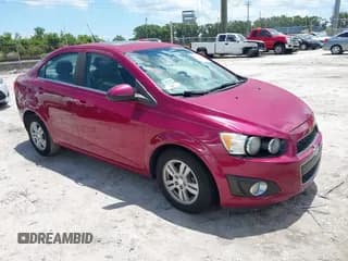 ✅ 2014 Chevrolet Sonic LT • VIN: 1G1JC5SB5E4122840 • Lot: 42276390. Listed on IAAI with 128,958 mi. Free auction sales archive from the USA and detailed vehicle history report at DreamBid. Image 1.
