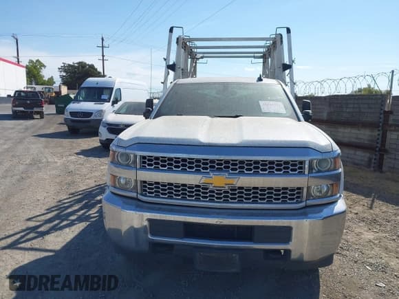 ✅ 2019 Chevrolet Silverado 2500HD Work Truck • VIN: 2GC2CREG1K1124277 • Лот: 43163771. Опубликован ранее на IAAI с пробегом 244 988 миль. Бесплатный доступ к архиву аукционных продаж из США и подробный отчёт об истории автомобиля на DreamBid. Изображение 12.