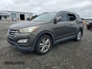 ✅ 2013 Hyundai Santa Fe Sport • VIN: 5XYZU3LA0DG052777 • Lot: 86338275. Listed on Copart with 174,940 mi. Free auction sales archive from the USA and detailed vehicle history report at DreamBid. Image 1.