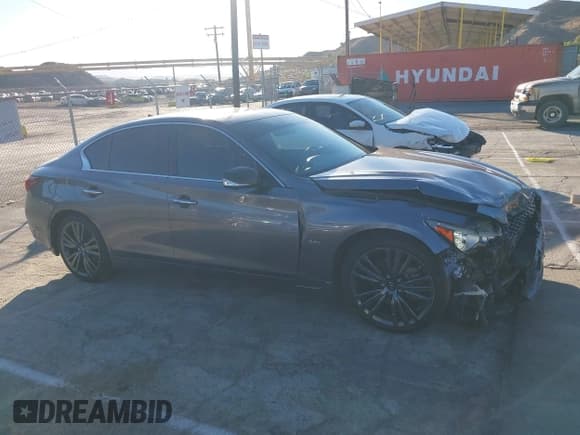 ✅ 2020 Infiniti Q50 Luxe • VIN: JN1EV7AR3LM256520 • Lot: 43493811. Wystawiony na IAAI z przebiegiem 43 884 mil. Bezpłatny archiwum sprzedaży aukcyjnych z USA i szczegółowy raport historii pojazdu na DreamBid. Zdjęcie 13.