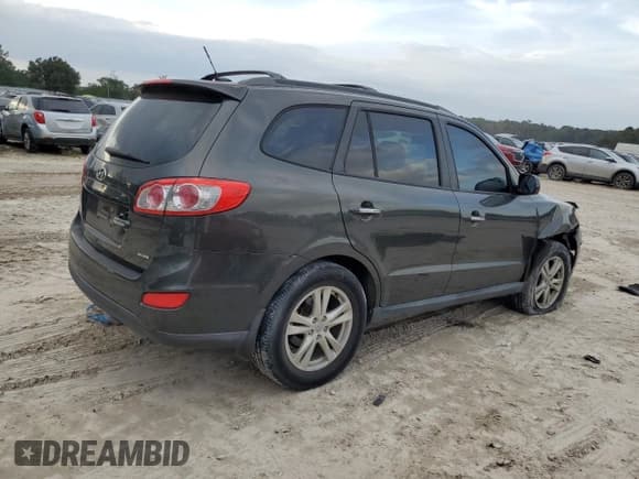 ✅ 2012 Hyundai Santa Fe Limited • VIN: 5XYZK4AG7CG117402 • Lot: 79994954. Listed on Copart with 154,544 mi. Free auction sales archive from the USA and detailed vehicle history report at DreamBid. Image 3.