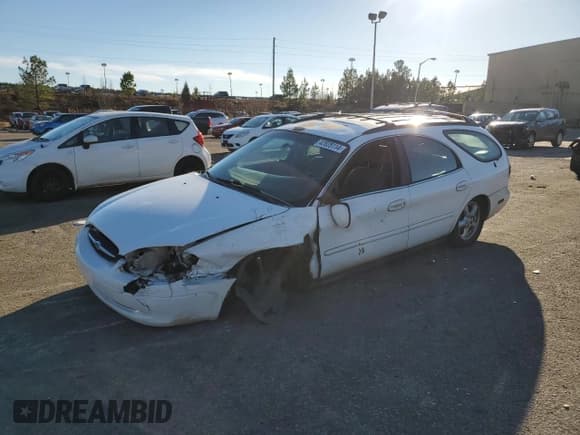 ✅ 2002 Ford Taurus SE Standard • VIN: 1FAFP58U52A144446 • Lot: 42825114. Listed on Copart with 182,653 mi. Free auction sales archive from the USA and detailed vehicle history report at DreamBid. Image 1.