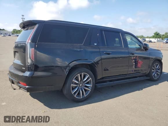 ✅ 2023 Cadillac Escalade ESV 4WD Sport Platinum • VIN: 1GYS4RKL6PR231414 • Лот: 64904735. Опубликован ранее на Copart с пробегом 95 666 миль. Бесплатный доступ к архиву аукционных продаж из США и подробный отчёт об истории автомобиля на DreamBid. Изображение 3.