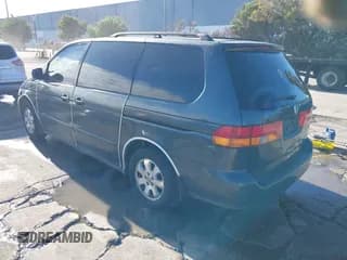 ✅ 2003 Honda Odyssey EX-L • VIN: 5FNRL18913B026944 • Lot: 43750155. Wystawiony na IAAI z przebiegiem 265 155 mil. Bezpłatny archiwum sprzedaży aukcyjnych z USA i szczegółowy raport historii pojazdu na DreamBid. Zdjęcie 3.