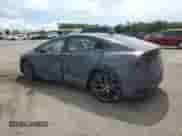 2024 Toyota Prius LE with VIN JTDACAAU5R3025104, listed as a Copart auction lot 65556565 with 18,003 mi miles and Salvage title. Bid and sale history available at DreamBid. Image 2.