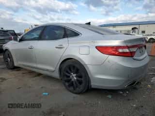 2013 Hyundai Azera z VIN KMHFH4JG5DA300781, wystawiony jako Copart lot #42493805 z przebiegiem 165 673 mil mil oraz Szkoda całkowita • Salvage title. Historia ofert i sprzedaży dostępna na DreamBid. Obrazek 2.