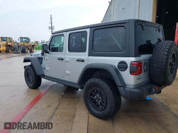 ✅ 2023 Jeep Wrangler Rubicon • VIN: 1C4JJXR63PW696801 • Lot: 43040800. Listed on IAAI with 2,699 mi. Free auction sales archive from the USA and detailed vehicle history report at DreamBid. Image 3.