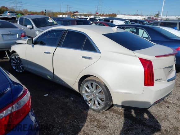 ✅ 2014 Cadillac ATS Luxury AWD • VIN: 1G6AH5RX4E0115978 • Lot: 43664263. Listed on IAAI with 106,871 mi. Free auction sales archive from the USA and detailed vehicle history report at DreamBid. Image 3.