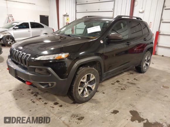 ✅ 2015 Jeep Cherokee Trailhawk • VIN: 1C4PJMBS7FW650340 • Lot: 43755791. Listed on IAAI with 129,855 mi. Free auction sales archive from the USA and detailed vehicle history report at DreamBid. Image 19.