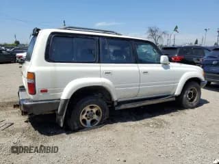 ✅ 1994 Toyota Land Cruiser • VIN: JT3DJ81W8R0093268 • Lot: 52818725. Listed on Copart with 300,159 mi. Free auction sales archive from the USA and detailed vehicle history report at DreamBid. Image 3.