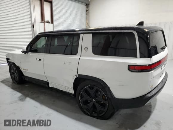 ✅ 2022 Rivian R1S Launch Edition • VIN: 7PDSGABL0NN001895 • Lot: 52285974. Listed on Copart with Not provided. Free auction sales archive from the USA and detailed vehicle history report at DreamBid. Image 2.