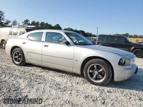 2010 Dodge Charger SXT с VIN 2B3CA3CV9AH242206, выставлен на аукционе Copart как лот 76139314 с пробегом 263 348 миль миль и Списание • Salvage title. История ставок и продаж доступна на DreamBid. Изображение 4.