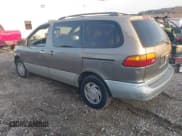 ✅ 1999 Toyota Sienna LE • VIN: 4T3ZF13C0XU138502 • Lot: 43725407. Listed on IAAI with 321,967 mi. Free auction sales archive from the USA and detailed vehicle history report at DreamBid. Image 3.