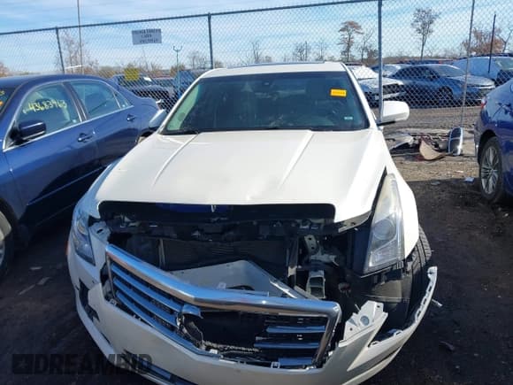 ✅ 2014 Cadillac ATS Luxury AWD • VIN: 1G6AH5RX4E0115978 • Lot: 43664263. Listed on IAAI with 106,871 mi. Free auction sales archive from the USA and detailed vehicle history report at DreamBid. Image 12.