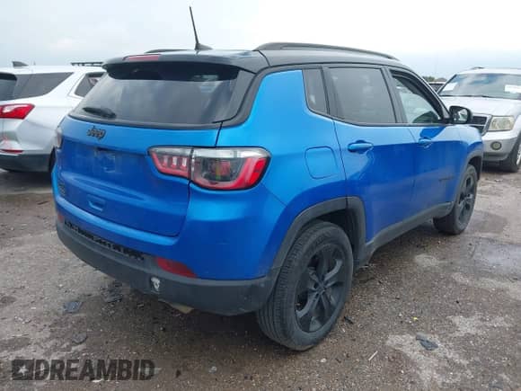 2021 Jeep Compass Latitude with VIN 3C4NJDBB2MT595256, listed as a IAAI auction lot 43058271 with 102,541 mi miles and . Bid and sale history available at DreamBid. Image 4.