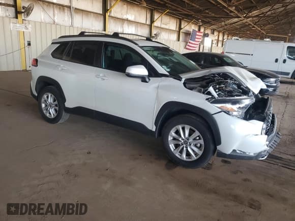 ✅ 2023 Toyota Corolla Cross LE • VIN: 7MUBAAAG8PV071516 • Lot: 87414505. Wystawiony na Copart z przebiegiem 35 598 mil. Bezpłatny archiwum sprzedaży aukcyjnych z USA i szczegółowy raport historii pojazdu na DreamBid. Zdjęcie 4.