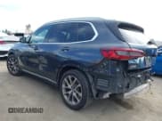 ✅ 2021 BMW X5 sDrive40i • VIN: 5UXCR4C06M9F26786 • Lot: 42254169. Listed on IAAI with 103,213 mi. Free auction sales archive from the USA and detailed vehicle history report at DreamBid. Image 3.