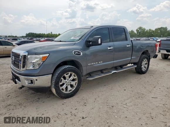 ✅ 2017 Nissan Titan SV • VIN: 1N6AA1F25HN544618 • Лот: 69580255. Опубликован ранее на Copart с пробегом 100 512 миль. Бесплатный доступ к архиву аукционных продаж из США и подробный отчёт об истории автомобиля на DreamBid. Изображение 1.