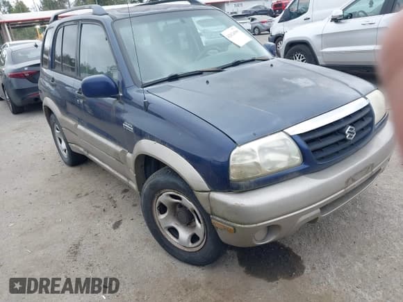 ✅ 2002 Suzuki Grand Vitara JLX • VIN: JS3TD62V524154472 • Lot: 42824509. Wystawiony na IAAI z przebiegiem 293 141 mil. Bezpłatny archiwum sprzedaży aukcyjnych z USA i szczegółowy raport historii pojazdu na DreamBid. Zdjęcie 1.