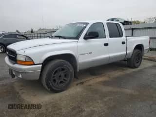 2002 Dodge Dakota SLT с VIN 1B7HL48N22S636413, выставлен на аукционе Copart как лот 47884475 с пробегом 226 723 миль миль и Чистый • Clean title. История ставок и продаж доступна на DreamBid. Изображение 1.