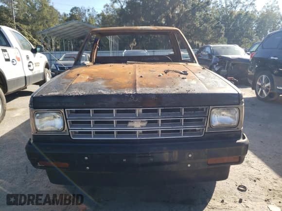 ✅ 1984 Chevrolet S-10 • VIN: 1GCCS14B7E8258694 • Лот: 79666174. Опубликован ранее на Copart с пробегом Не указан. Бесплатный доступ к архиву аукционных продаж из США и подробный отчёт об истории автомобиля на DreamBid. Изображение 5.