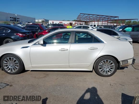 ✅ 2012 Cadillac CTS Premium • VIN: 1G6DP5E39C0109075 • Lot: 43130937. Listed on IAAI with 148,983 mi. Free auction sales archive from the USA and detailed vehicle history report at DreamBid. Image 14.