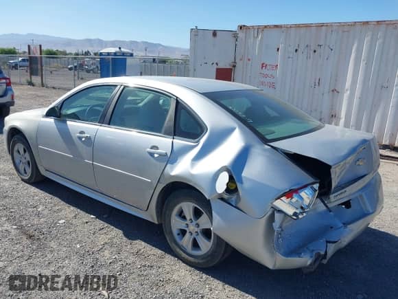 2013 Chevrolet Impala LS z VIN 2G1WF5E35D1265220, wystawiony jako IAAI lot #42559869 z przebiegiem 124 046 mil mil oraz . Historia ofert i sprzedaży dostępna na DreamBid. Obrazek 3.