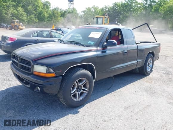 ✅ 2000 Dodge Dakota • VIN: 1B7GL22X2YS577673 • Lot: 42128456. Wystawiony na IAAI z przebiegiem Nie podano. Bezpłatny archiwum sprzedaży aukcyjnych z USA i szczegółowy raport historii pojazdu na DreamBid. Zdjęcie 2.