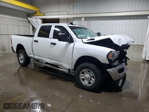 ✅ 2023 Ram 2500 Tradesman • VIN: 3C6UR5CJ0PG504764 • Lot: 67940985. Listed on Copart with 51,210 mi. Free auction sales archive from the USA and detailed vehicle history report at DreamBid. Image 4.