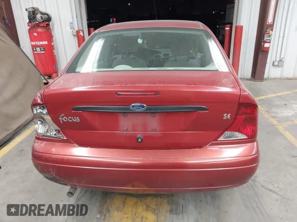 ✅ 2003 Ford Focus SE • VIN: 1FAFP34Z83W231672 • Lot: 42322702. Listed on IAAI with 173,625 mi. Free auction sales archive from the USA and detailed vehicle history report at DreamBid. Image 16.