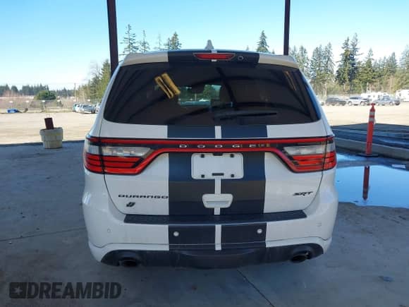 2018 Dodge Durango SRT with VIN 1C4SDJGJ3JC395759, listed as a IAAI auction lot 41689356 with 83,577 mi miles and . Bid and sale history available at DreamBid. Image 17.