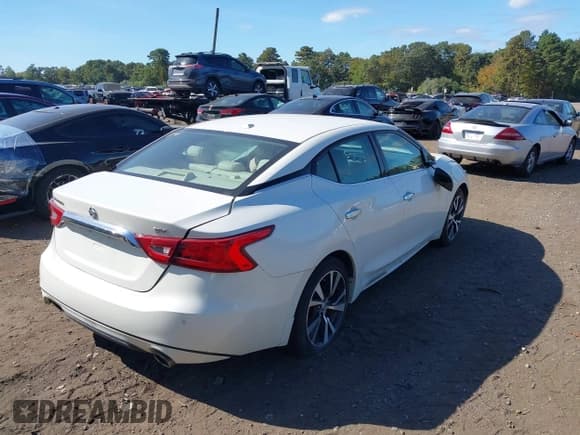 ✅ 2016 Nissan Maxima SL • VIN: 1N4AA6AP7GC439002 • Lot: 40511967. Wystawiony na IAAI z przebiegiem 87 038 mil. Bezpłatny archiwum sprzedaży aukcyjnych z USA i szczegółowy raport historii pojazdu na DreamBid. Zdjęcie 4.