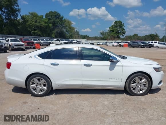 ✅ 2015 Chevrolet Impala LS • VIN: 2G11X5SL8F9246435 • Lot: 43173928. Listed on IAAI with 263,809 mi. Free auction sales archive from the USA and detailed vehicle history report at DreamBid. Image 13.