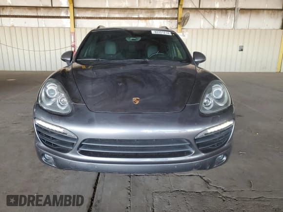 ✅ 2012 Porsche Cayenne S Hybrid • VIN: WP1AE2A27CLA92565 • Lot: 82221214. Listed on Copart with 130,210 mi. Free auction sales archive from the USA and detailed vehicle history report at DreamBid. Image 5.
