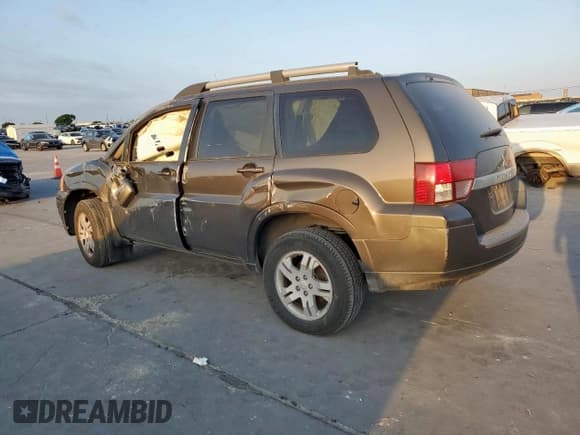 ✅ 2011 Mitsubishi Endeavor LS • VIN: 4A4JM2AS6BE035354 • Lot: 51950515. Listed on Copart with 160,438 mi. Free auction sales archive from the USA and detailed vehicle history report at DreamBid. Image 2.