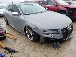 ✅ 2014 Audi RS 7 Prestige • VIN: WUAW2AFCXEN902390 • Lot: 40151564. Listed on Copart with 101,392 mi. Free auction sales archive from the USA and detailed vehicle history report at DreamBid. Image 4.