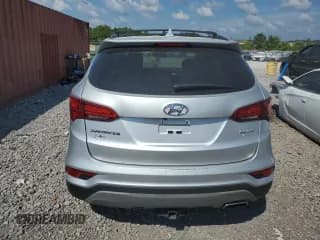 ✅ 2018 Hyundai Santa Fe 2.4L • VIN: 5XYZU3LB2JG561483 • Лот: 60343064. Опубликован ранее на Copart с пробегом 128 845 миль. Бесплатный доступ к архиву аукционных продаж из США и подробный отчёт об истории автомобиля на DreamBid. Изображение 6.