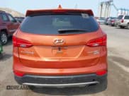 ✅ 2014 Hyundai Santa Fe • VIN: 5XYZTDLB0EG208769 • Lot: 42485411. Wystawiony na IAAI z przebiegiem 82 173 mil. Bezpłatny archiwum sprzedaży aukcyjnych z USA i szczegółowy raport historii pojazdu na DreamBid. Zdjęcie 16.