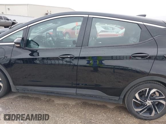 ✅ 2023 Chevrolet Bolt EV 2LT • VIN: 1G1FX6S02P4143467 • Lot: 41607322. Wystawiony na IAAI z przebiegiem 95 398 mil. Bezpłatny archiwum sprzedaży aukcyjnych z USA i szczegółowy raport historii pojazdu na DreamBid. Zdjęcie 14.