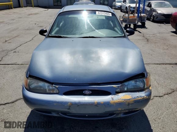✅ 1999 Ford Escort LX • VIN: 1FAFP10P4XW112449 • Lot: 67313405. Listed on Copart with 134,715 mi. Free auction sales archive from the USA and detailed vehicle history report at DreamBid. Image 5.