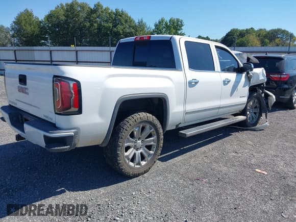 ✅ 2017 GMC Sierra 1500 Denali • VIN: 3GTU2PEJ0HG147836 • Lot: 43410221. Listed on IAAI with 98,619 mi. Free auction sales archive from the USA and detailed vehicle history report at DreamBid. Image 4.