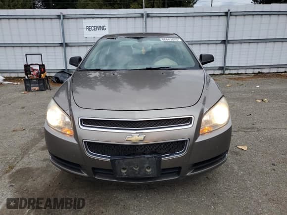 ✅ 2012 Chevrolet Malibu 1LS • VIN: 1G1ZB5E09CF150285 • Lot: 86843625. Listed on Copart with 129,115 mi. Free auction sales archive from the USA and detailed vehicle history report at DreamBid. Image 5.
