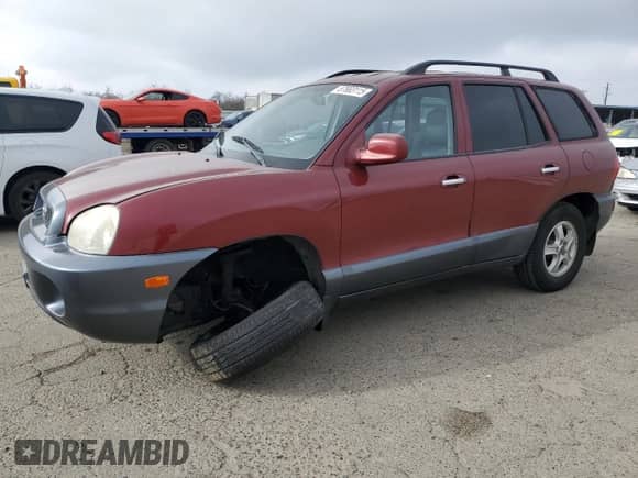 2002 Hyundai Santa Fe GLS z VIN KM8SC13D02U173092, wystawiony jako Copart lot #87683115 z przebiegiem 96 950 mil mil oraz Szkoda całkowita • Salvage title. Historia ofert i sprzedaży dostępna na DreamBid. Obrazek 1.